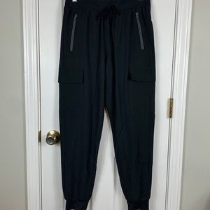 NWOT Libin black light weight hiking pants size medium. 3 zippered pockets.